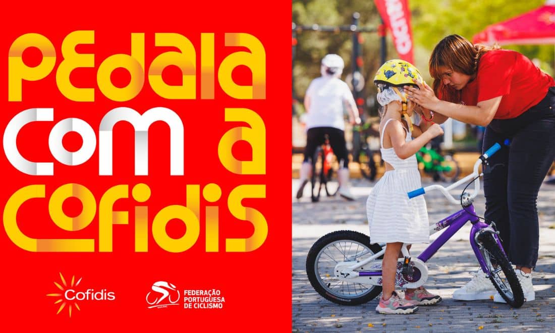 Cartaz "Pedala com a Cofidis" com fundo vermelho e uma criança com uma adulta e uma bicicleta de criança
