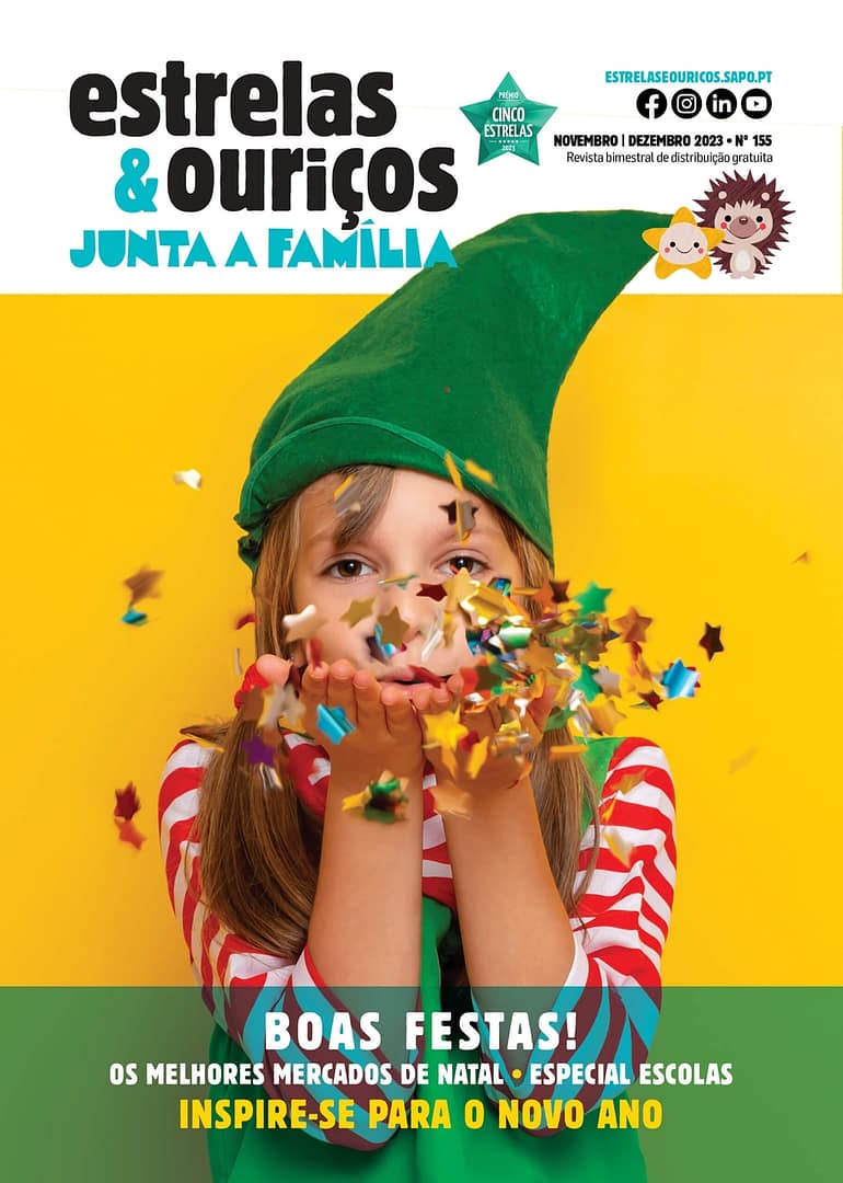 capa da revista estrelas e ouriços de novembro e dezembro de 2023 com menina de barrete de duende a soprar confetis
